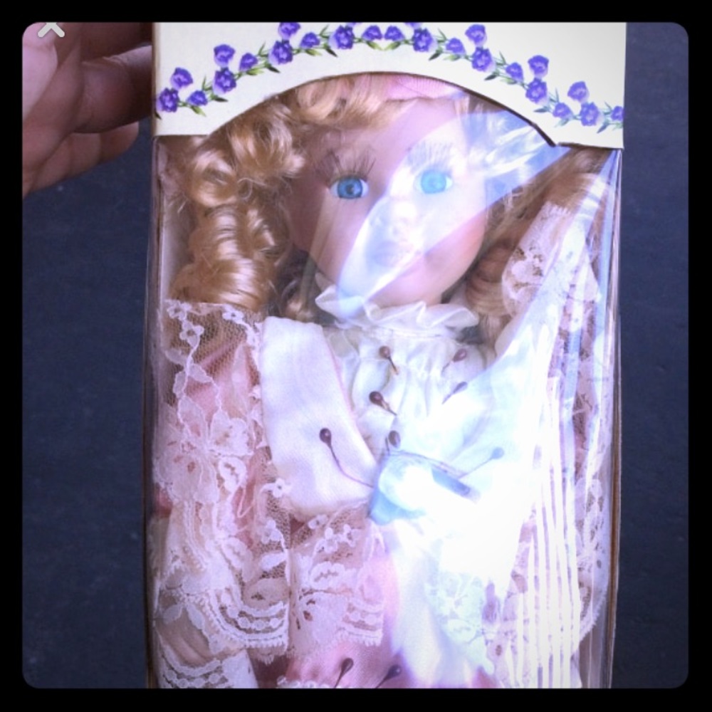 Porcelain doll vintage but new in box